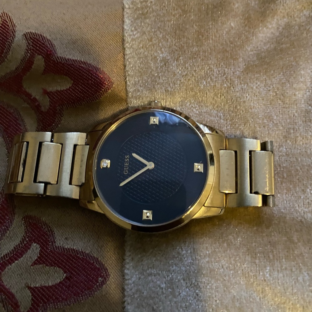 Stainless steel gold guess watch